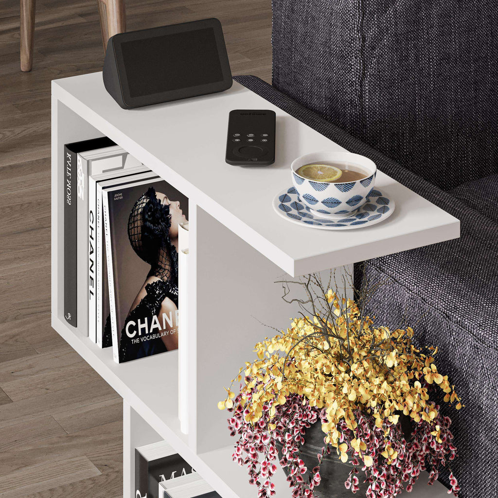 White modern side table with 4 open shelves, tablet and cup on top