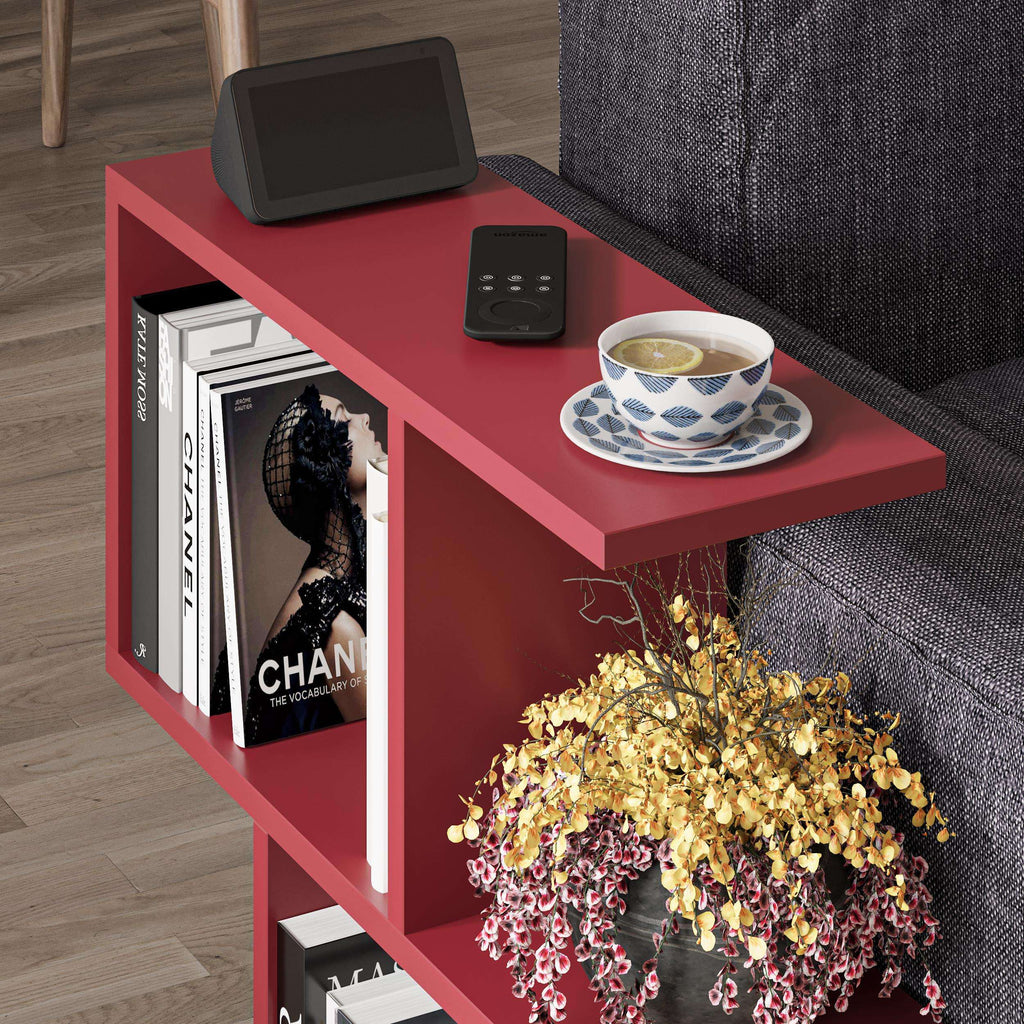 Modern side table with 4 open shelves, red frame and top, side view with decor
