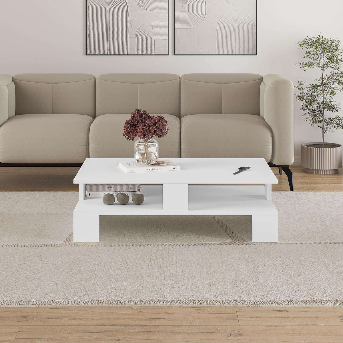 White coffee table with open shelf holding decorative items