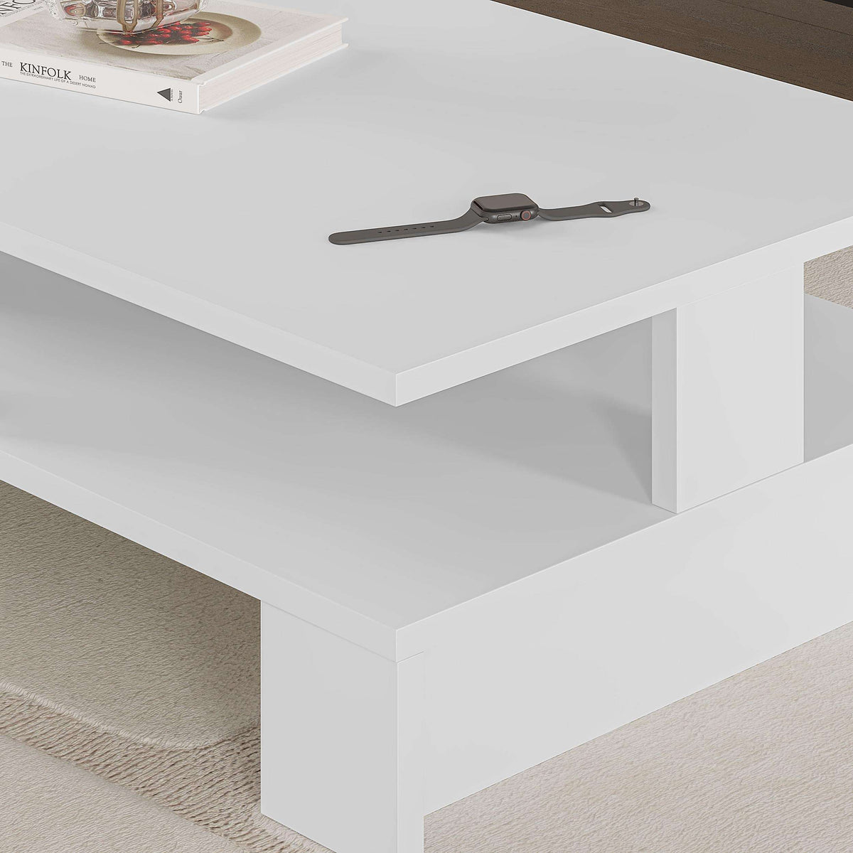 White coffee table close-up with top surface and open storage shelf