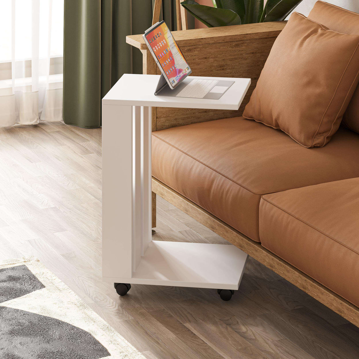 Modern side table in white with lower shelf and rolling caster wheels