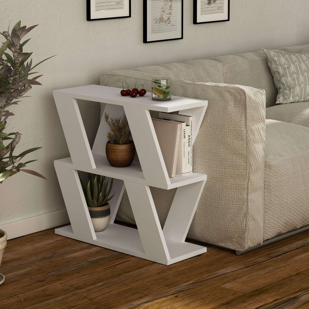 Compact modern side table in white with open cubby shelves and decorative plants