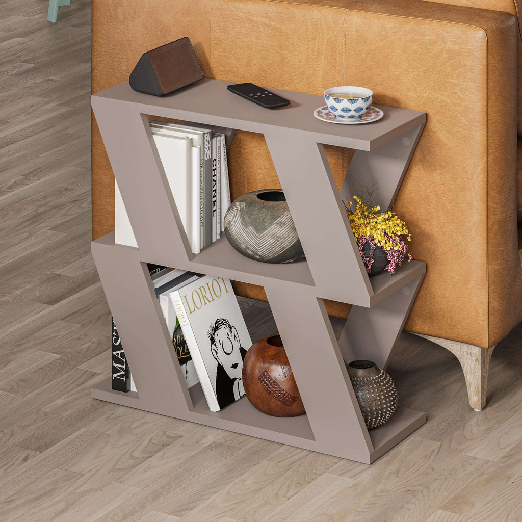 White open-shelf side table with tabletop items, decorative books and vase on display