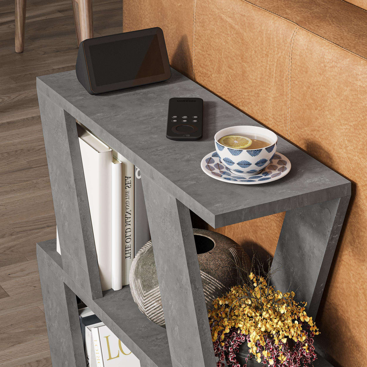 Compact modern side table with grey stone-look top and open cubby shelves