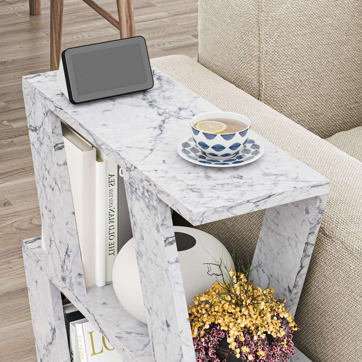 Compact modern side table with white marble-look top and open storage shelf