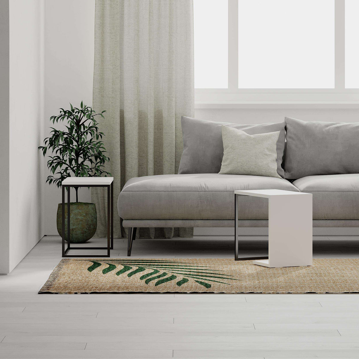 White nesting side table set with black metal frame beside sofa