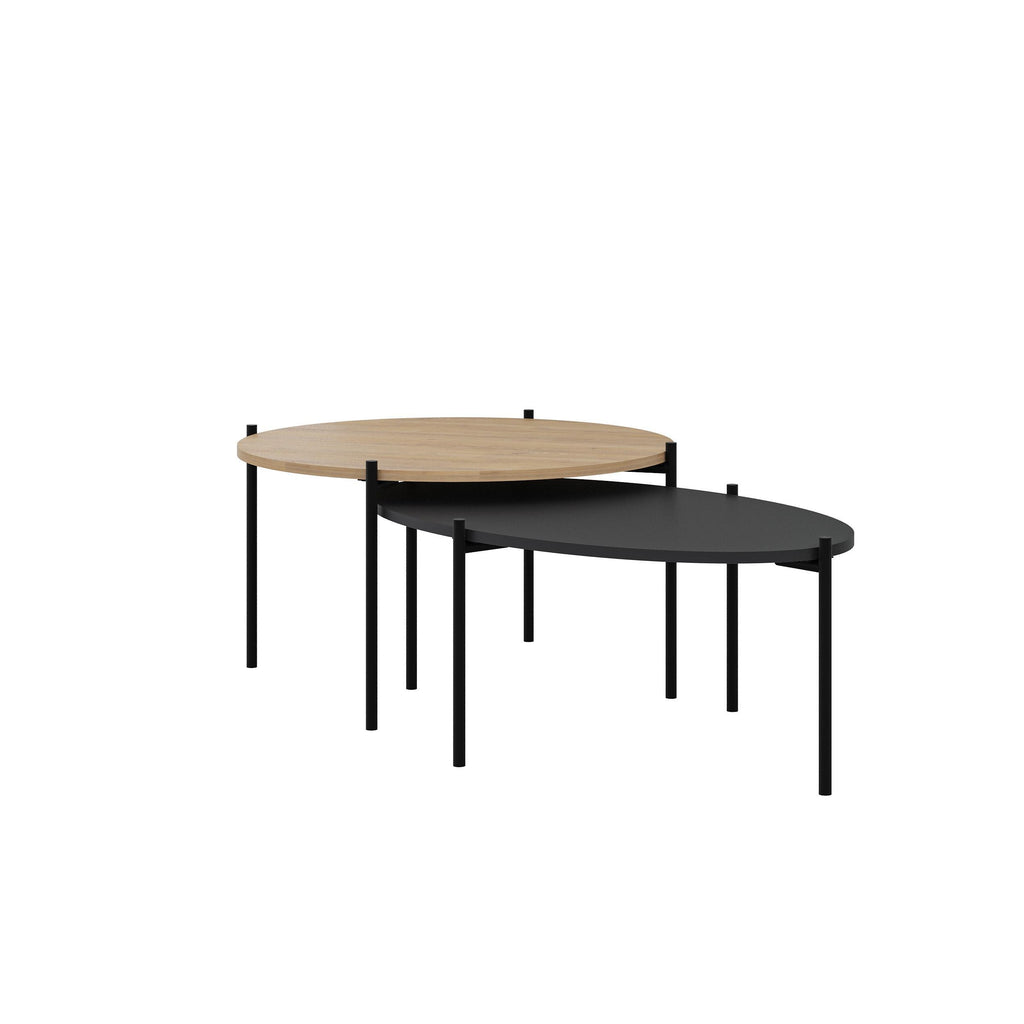 Nesting round and oval coffee tables with light wood top and black top on black legs