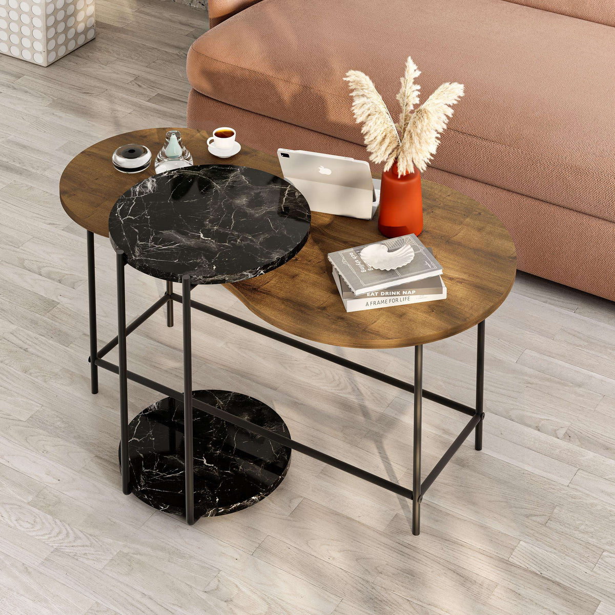 Round nested coffee table set with dark marble-look tops and black metal frame