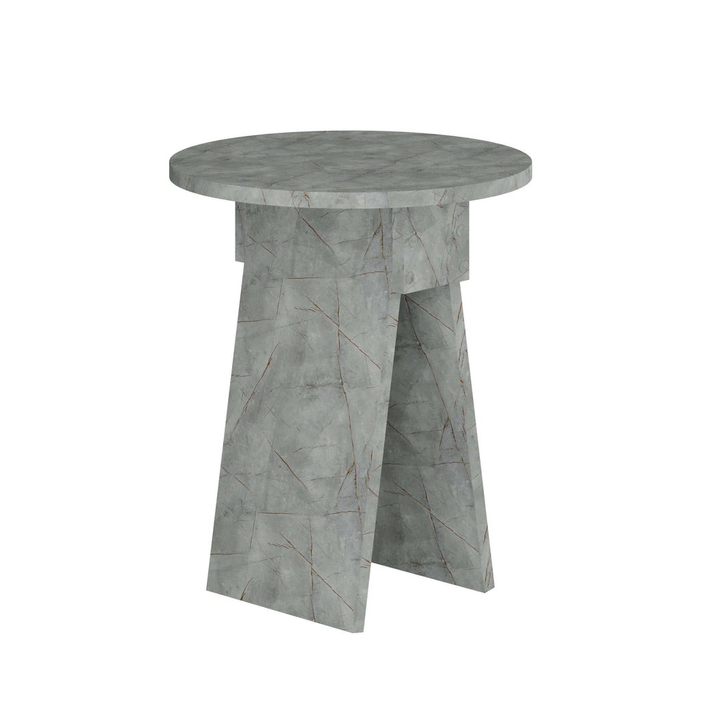 Light grey round side table with marble-look veining and tapered four-leg base