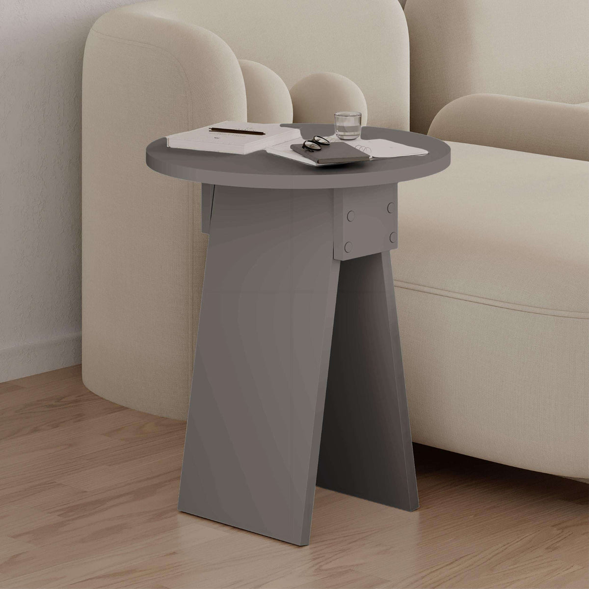 Light Mocha round side table with smooth top and four-sided pedestal legs