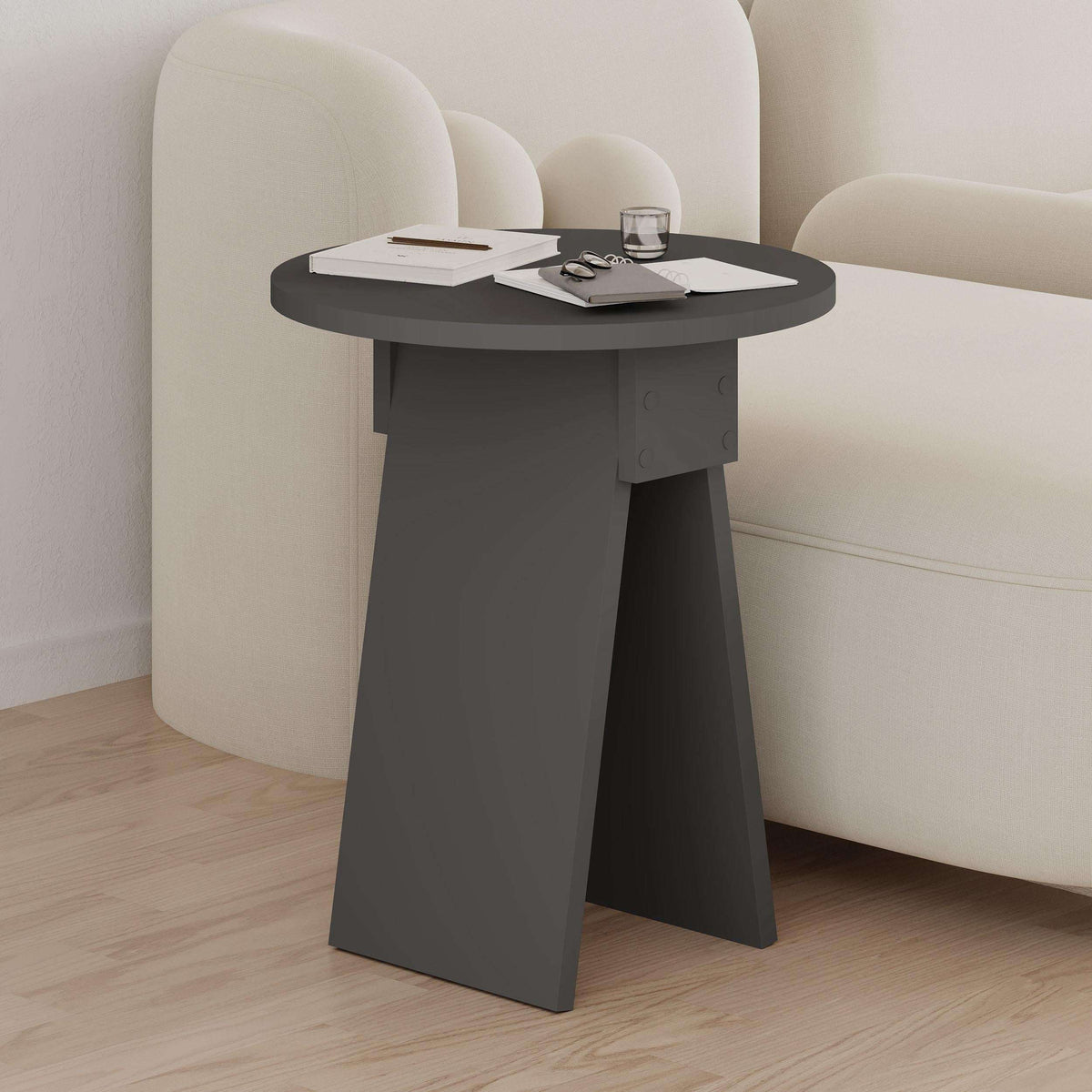 Anthracite modern round side table with flat top and wide base