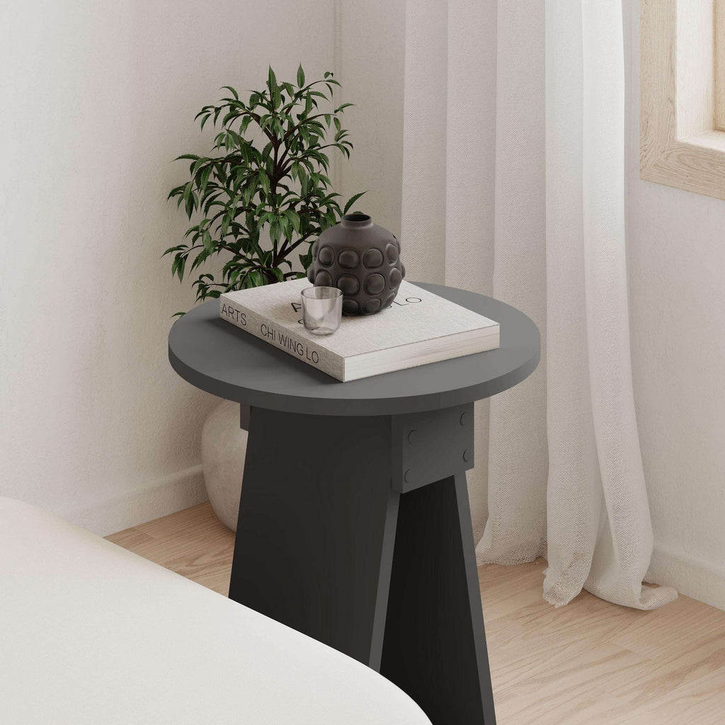 Anthracite modern round side table with decorative paneling on legs