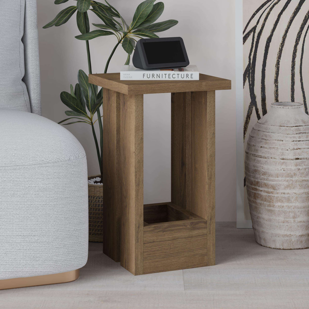 Light wood side table with open lower shelf and top surface for bedside or sofa use