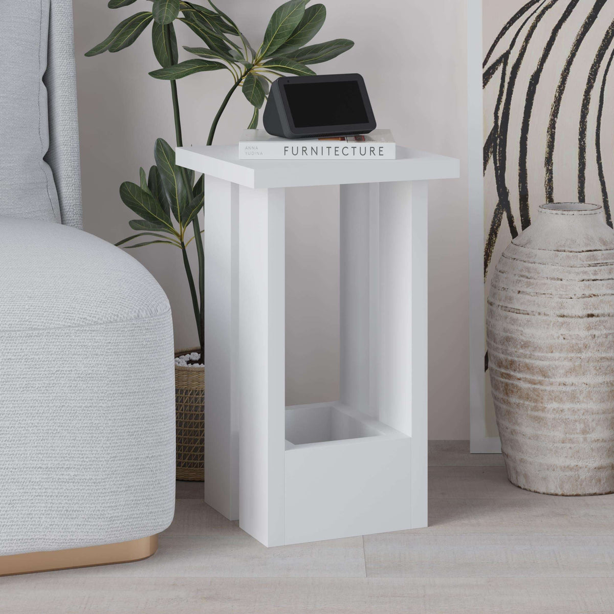 White compact side table with open shelf and small top ledge for decor