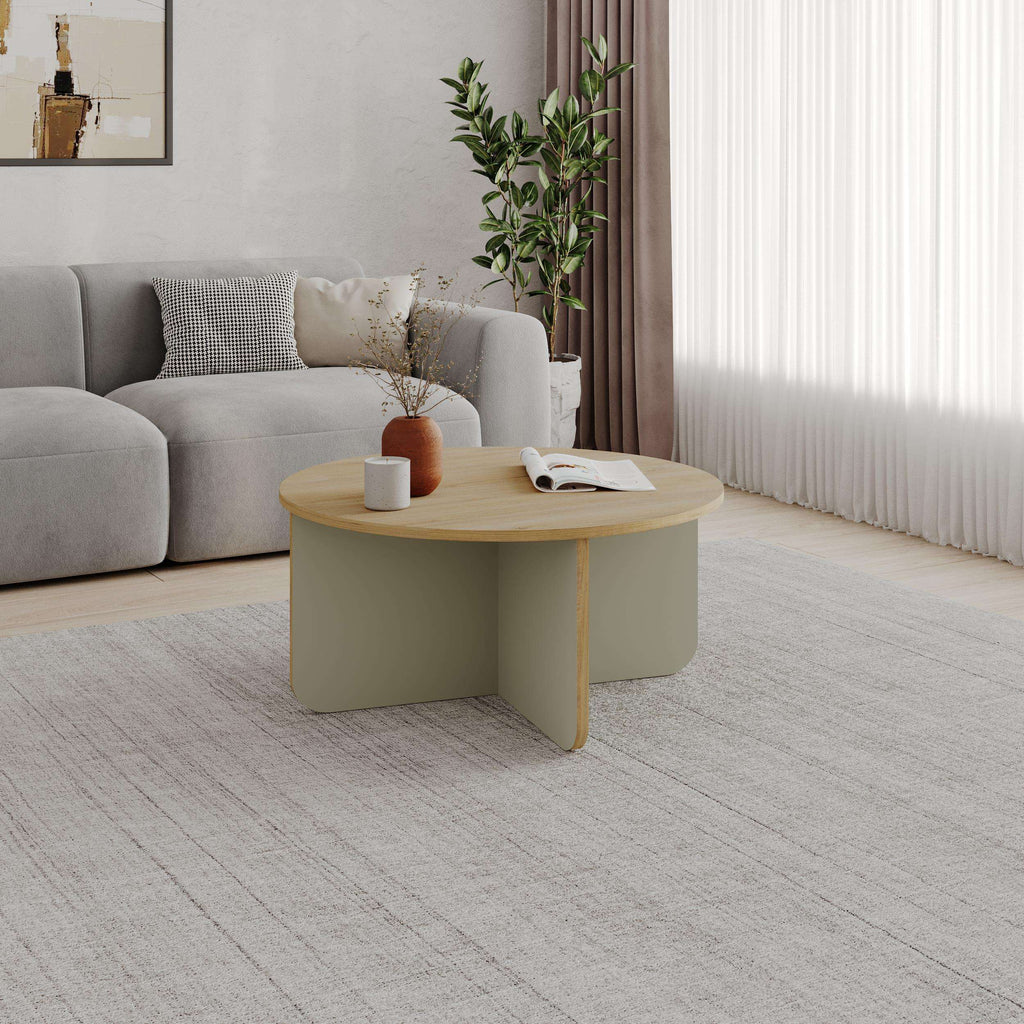 Round coffee table with light tan wood base and smooth light gray top