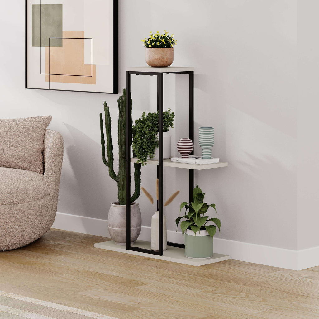 Three-tier modern plant stand shelves with black frame and potted plants in front view.