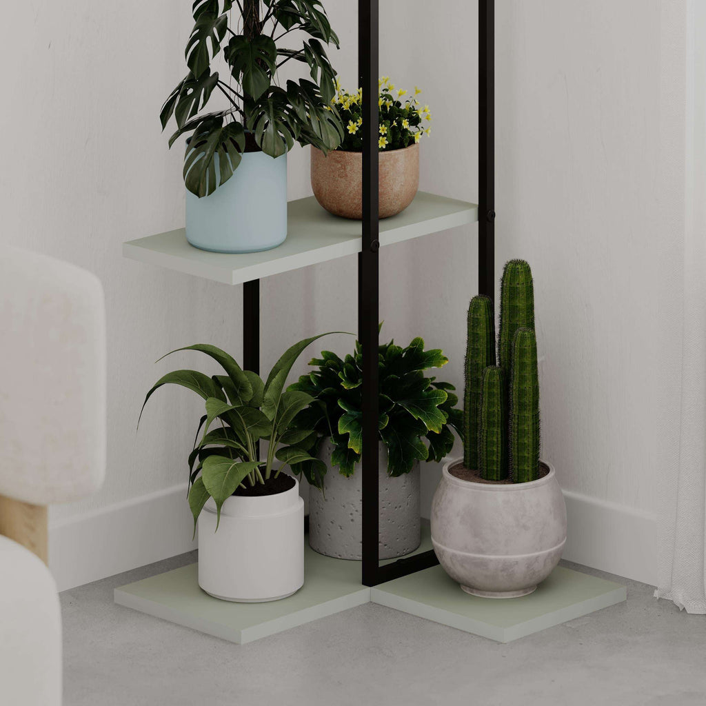 Three-tier modern plant stand shelves with black frame and potted plants on light shelves.