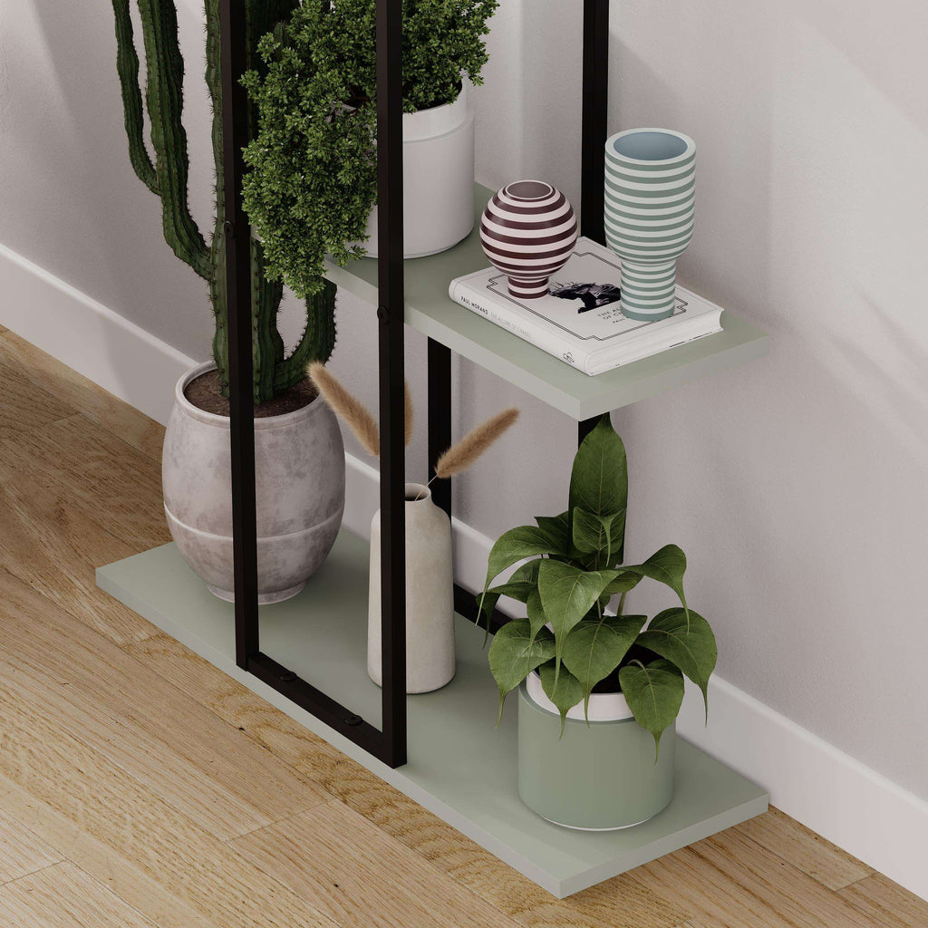 Three-tier modern plant stand shelves with black frame and potted plants on light shelves.