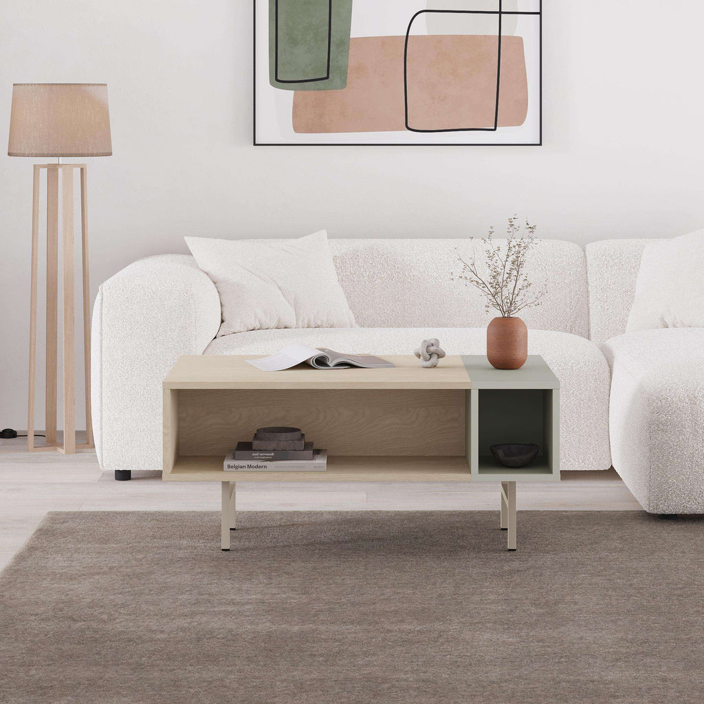Modern coffee table with light oak top, open shelf storage, and side cubby, 4 legs.