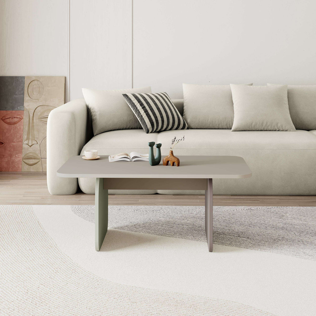 Light oak radius coffee table with rounded top and curved legs in living room