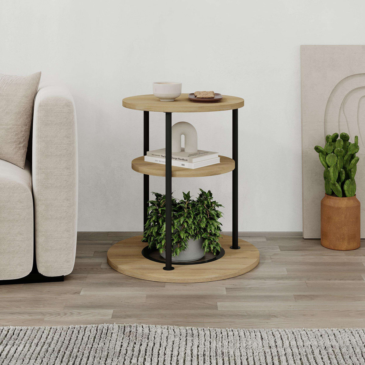Oak round side table with open shelf, black legs, and circular base