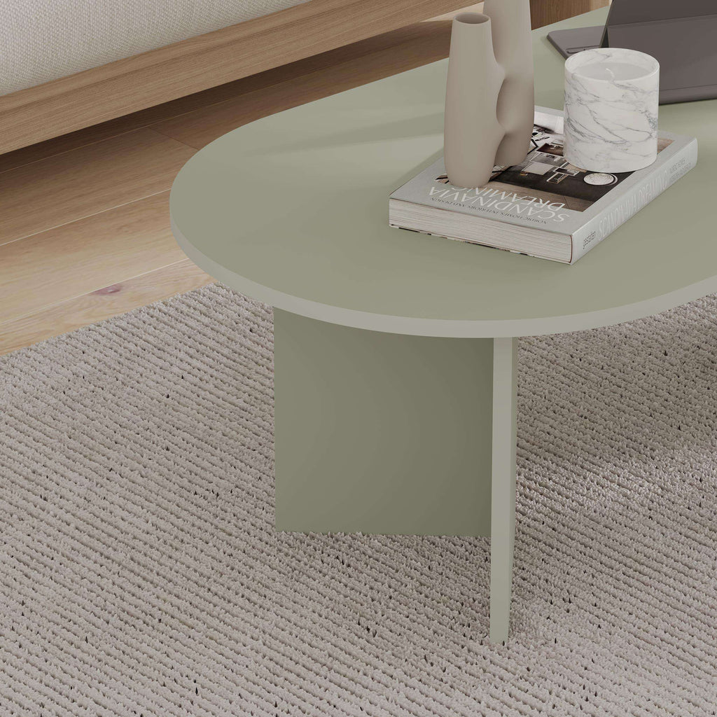 Oval coffee table in Ash Green with smooth finish and straight legs