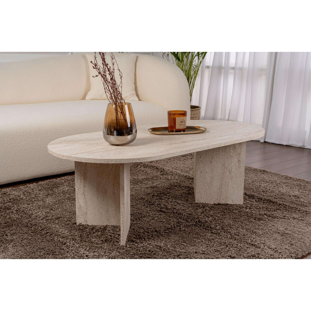 Oval travertine coffee table with stone top and sturdy pedestal base