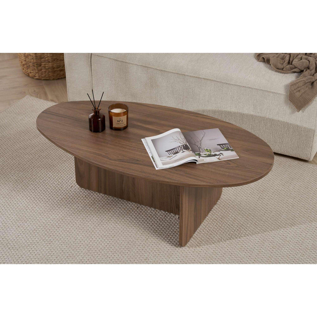Oval coffee table with medium walnut wood finish and flat, low profile frame.