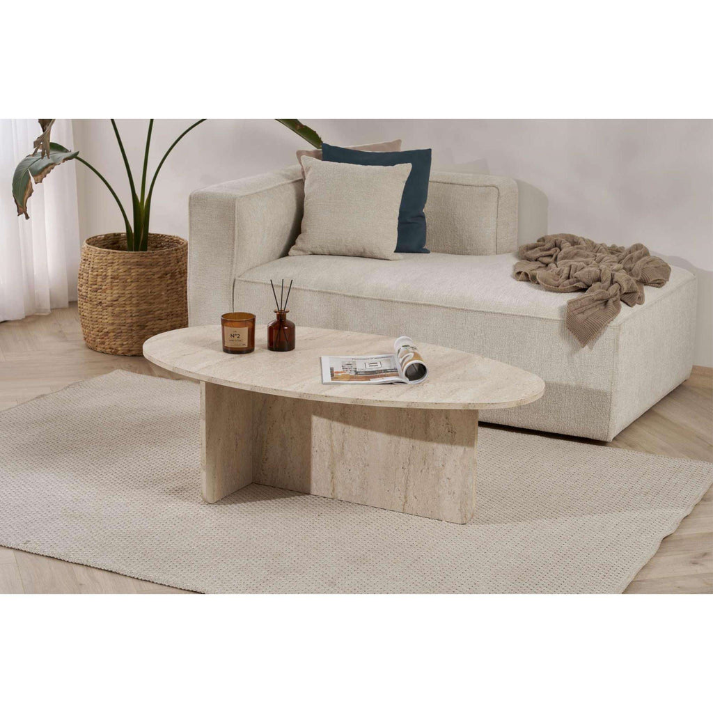 Oval coffee table with light stone-look finish and sturdy block legs