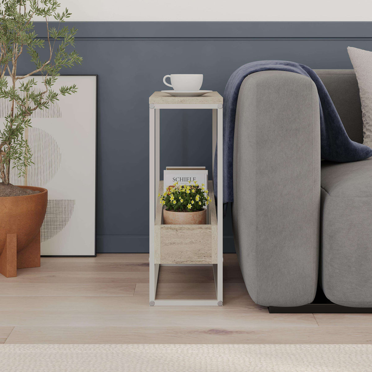 Slim side table with travertine-style top and shelves and dark frame, open front
