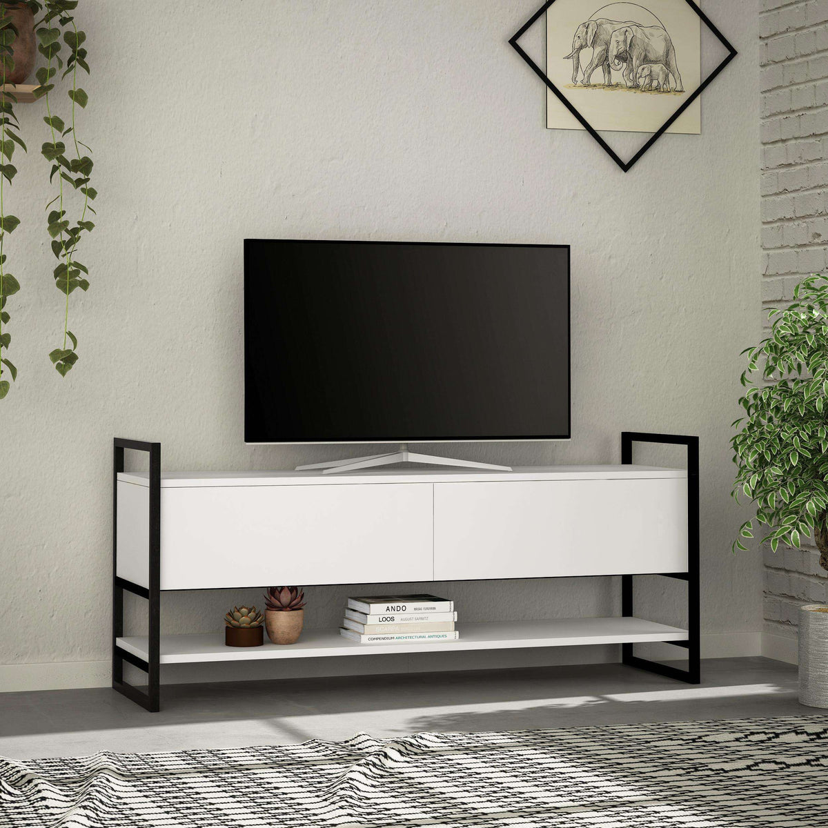 White TV stand with two cabinet doors and central open shelf, TV screen on top