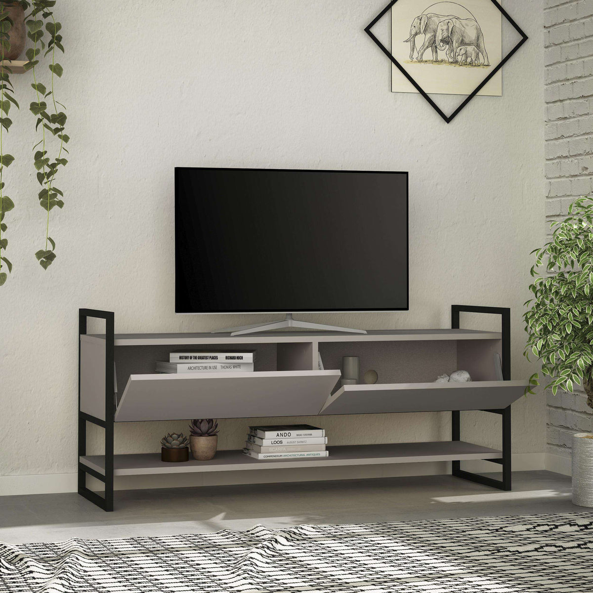 Modern TV stand with open shelves and two-tone frame; light gray finish, dark legs.