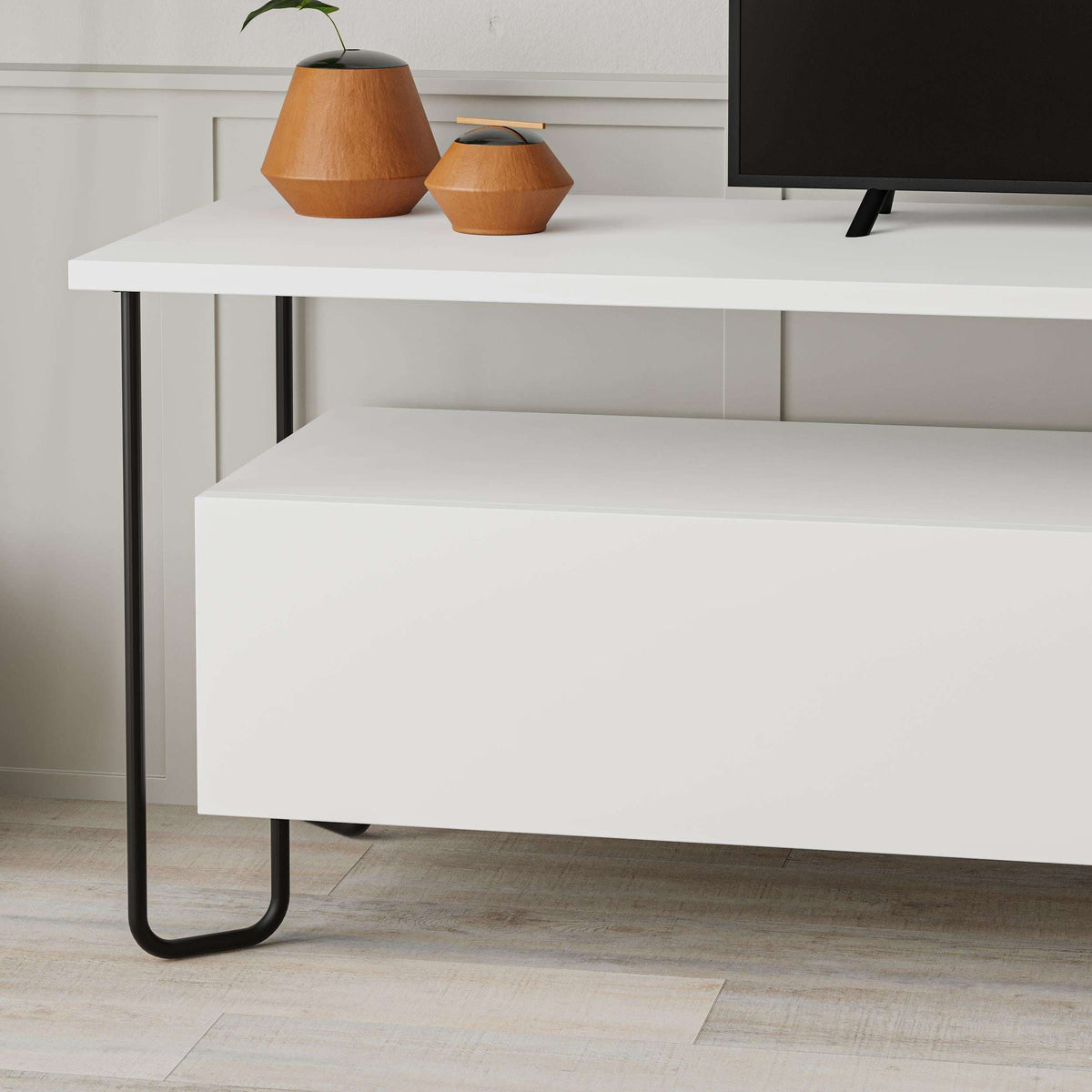 White TV console with open storage shelf and two cabinet doors