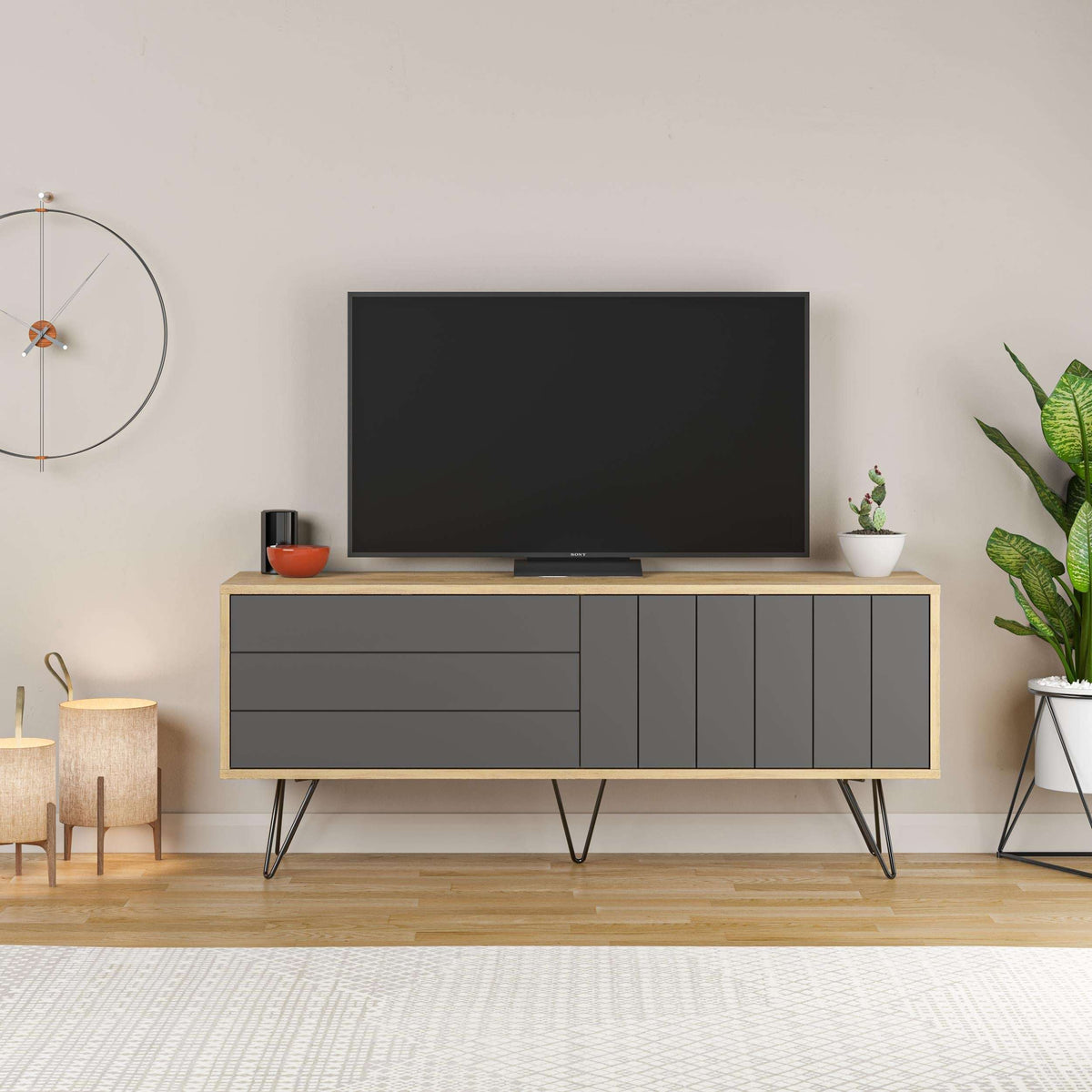 Modern TV stand with storage, white frame and anthracite doors beneath TV