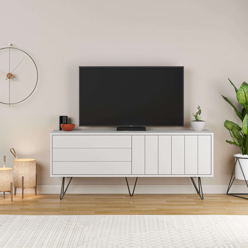White TV stand with long drawer and slatted cabinet doors, TV centered on top