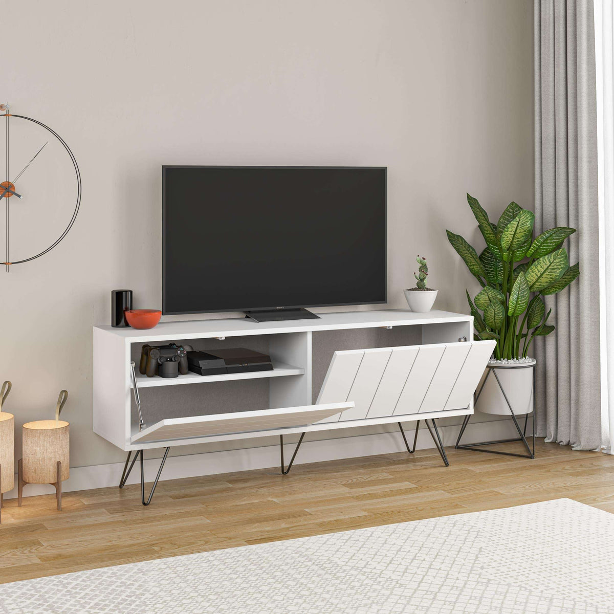 White TV stand with center open storage and slatted cabinet doors, black legs