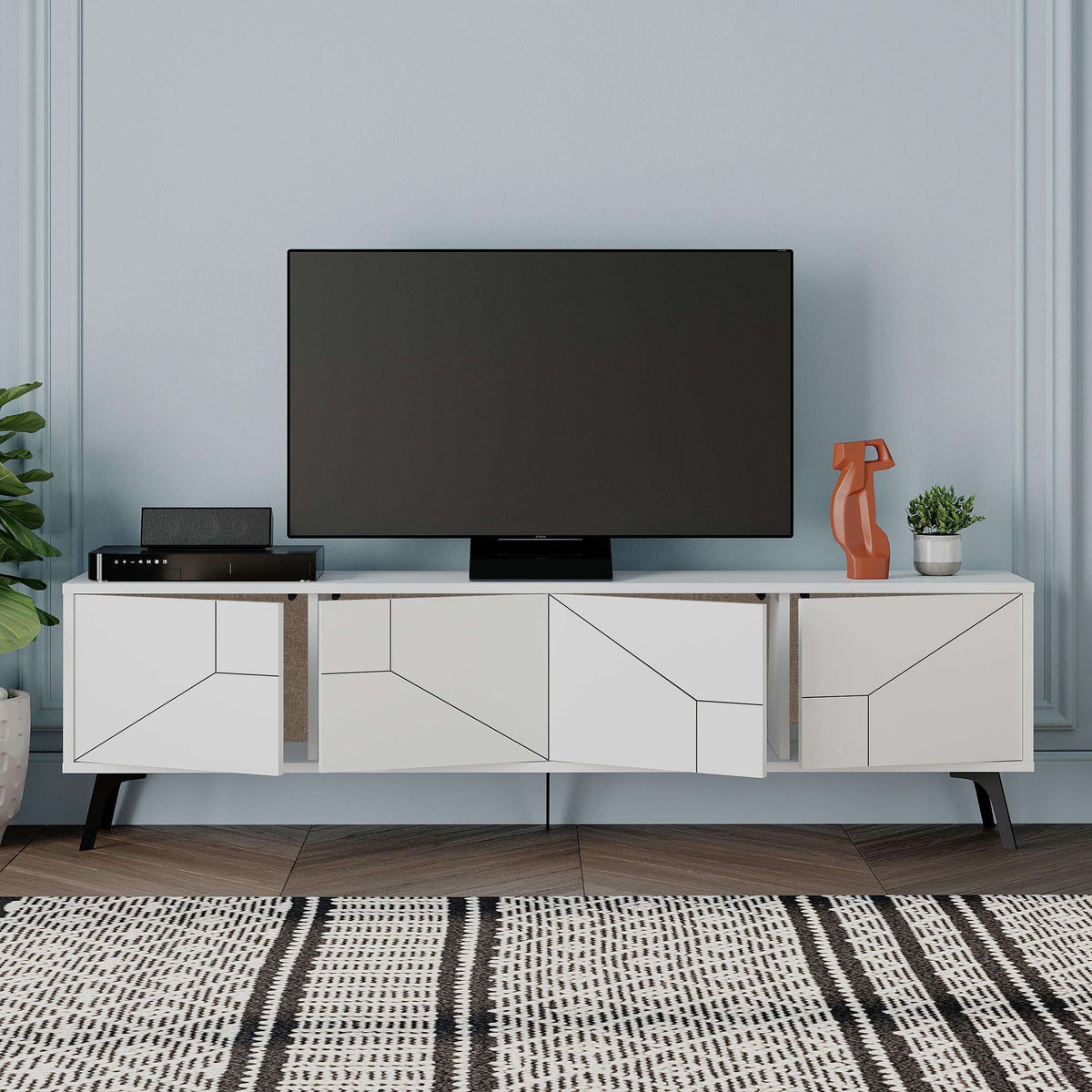 White modern TV stand with storage cabinet and four geometric drawer fronts