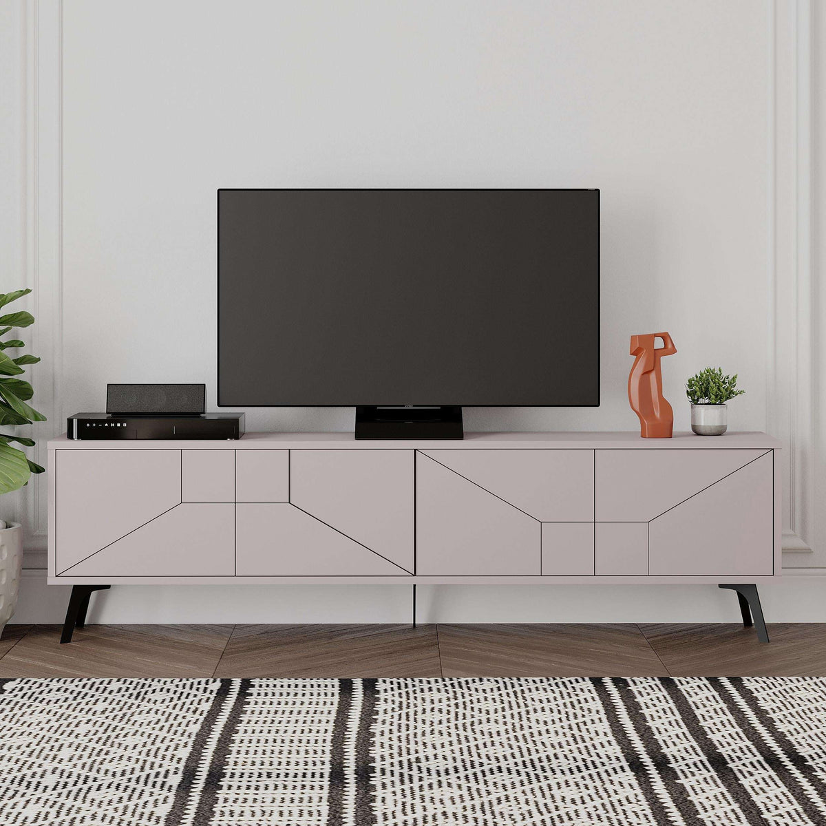 Light mocha media console with multiple storage compartments, geometric fronts, and black legs