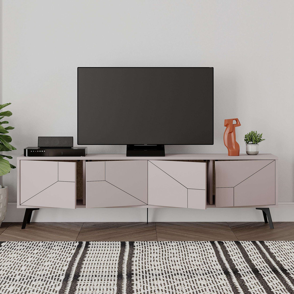 Light mocha TV stand with open center shelf, geometric cabinet doors, and black feet