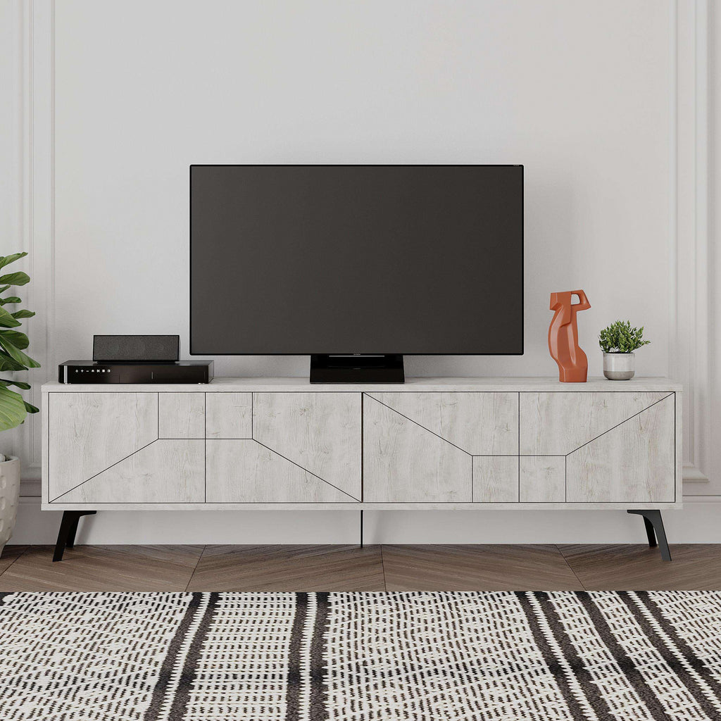 Anthracite grey TV stand with geometric panel doors, long console base, and slim legs