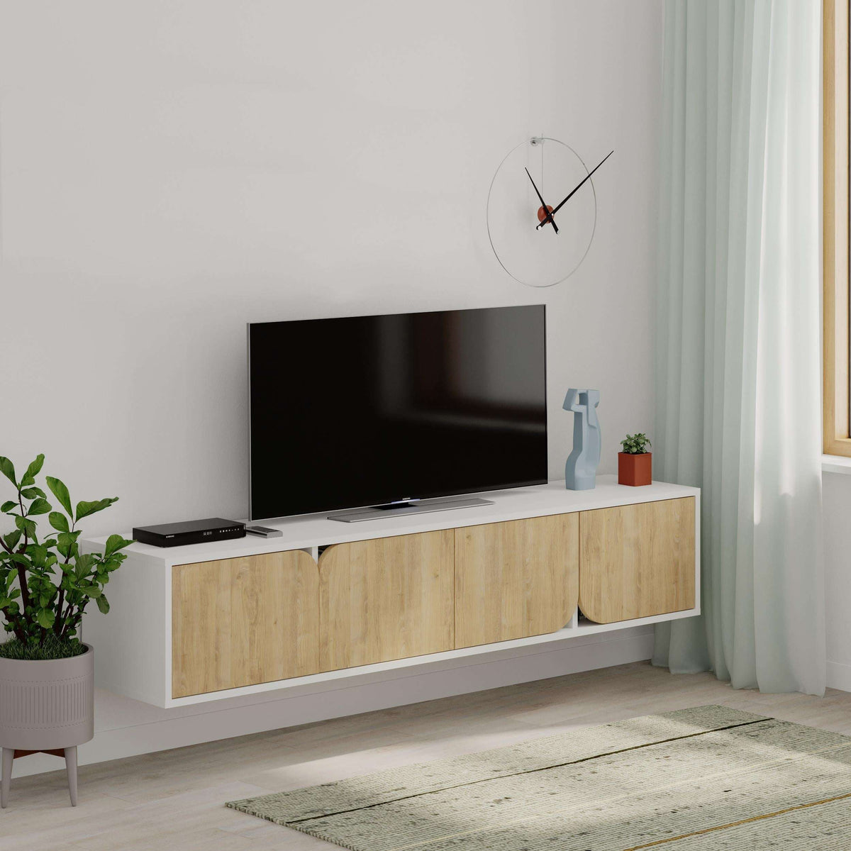 Floating TV stand with light oak front panels and anthracite top holding a soundbar.