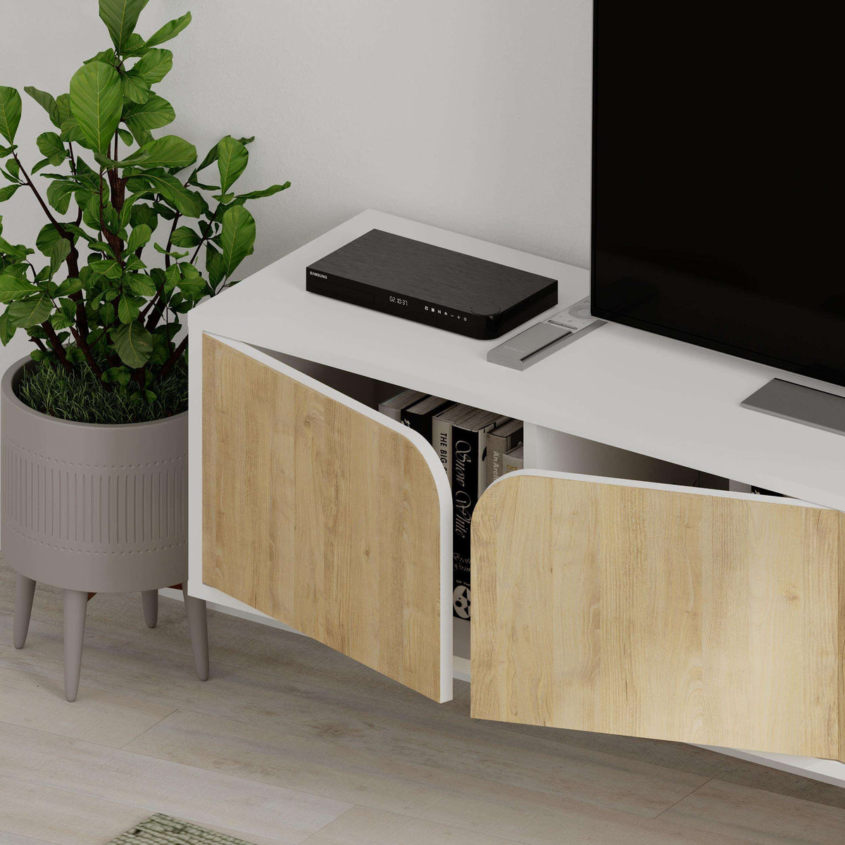 Floating TV stand with anthracite top and light oak cabinet doors with arched cutout.