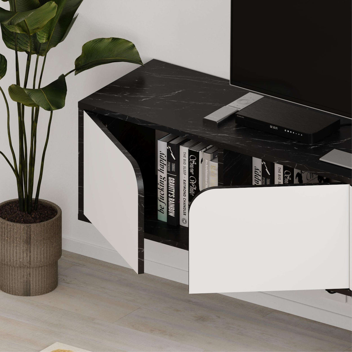 Floating TV stand with black top and white drawer cabinet, open shelf for media storage