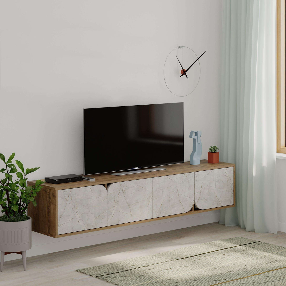 Modern floating TV stand with black TV and light oak frame, white marble-look doors