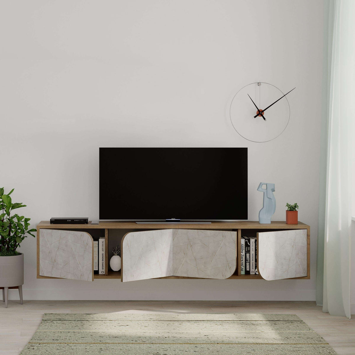 Floating TV stand with black top and white marble-look doors plus curved center