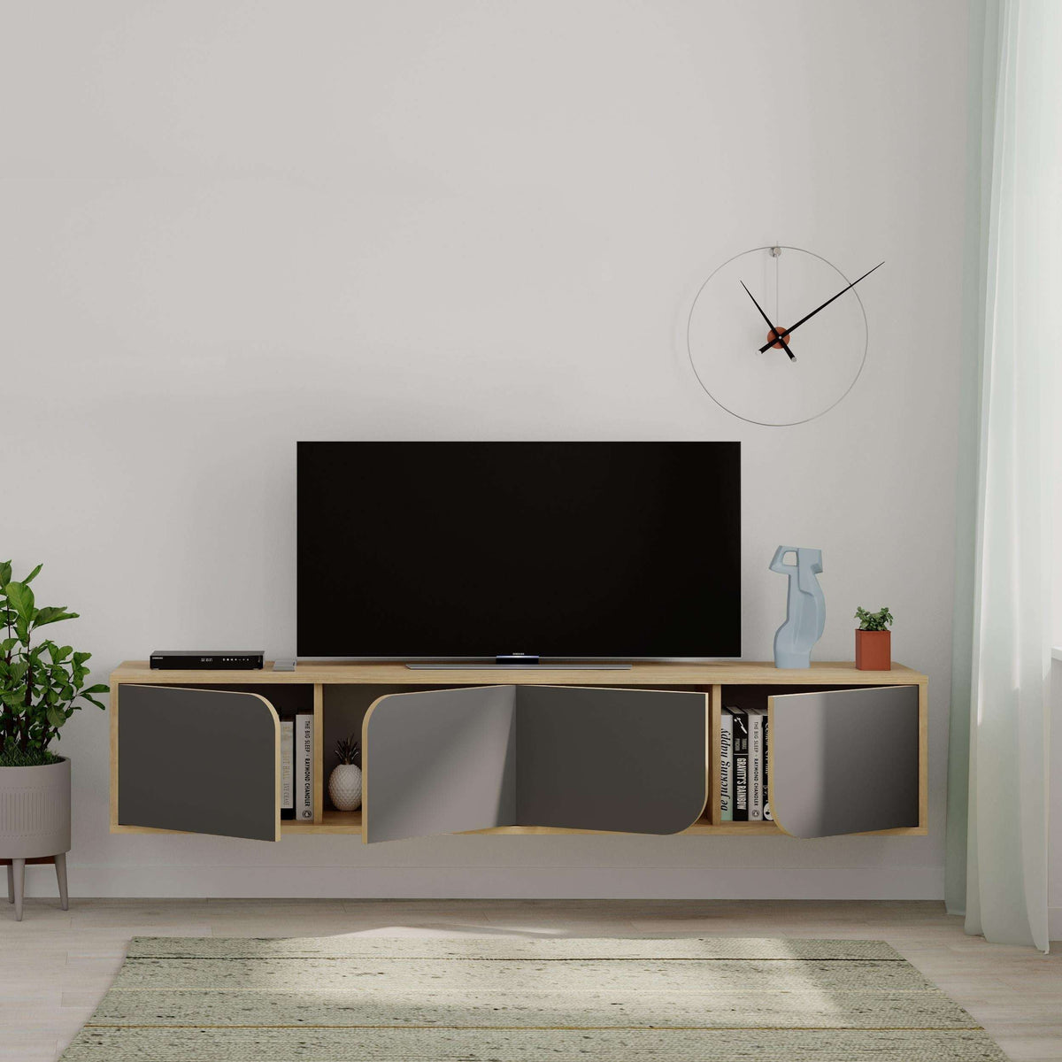 Modern floating TV stand with open shelving and dark gray drawer fronts