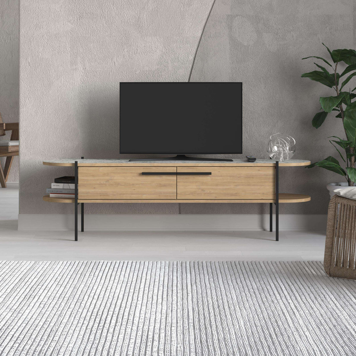 Modern TV stand with oak finish, stone tabletop, two drawers, open shelf, black metal legs.