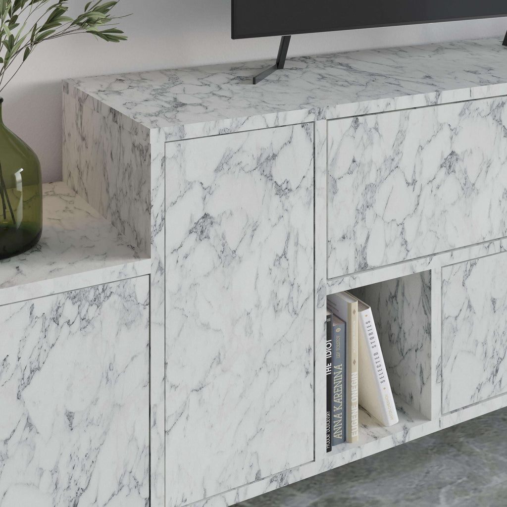 Marble-effect TV cabinet with open shelves and book storage in center compartment