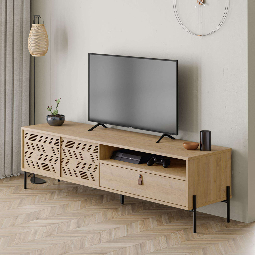 Light oak media console with open center shelf, patterned doors, and two drawers