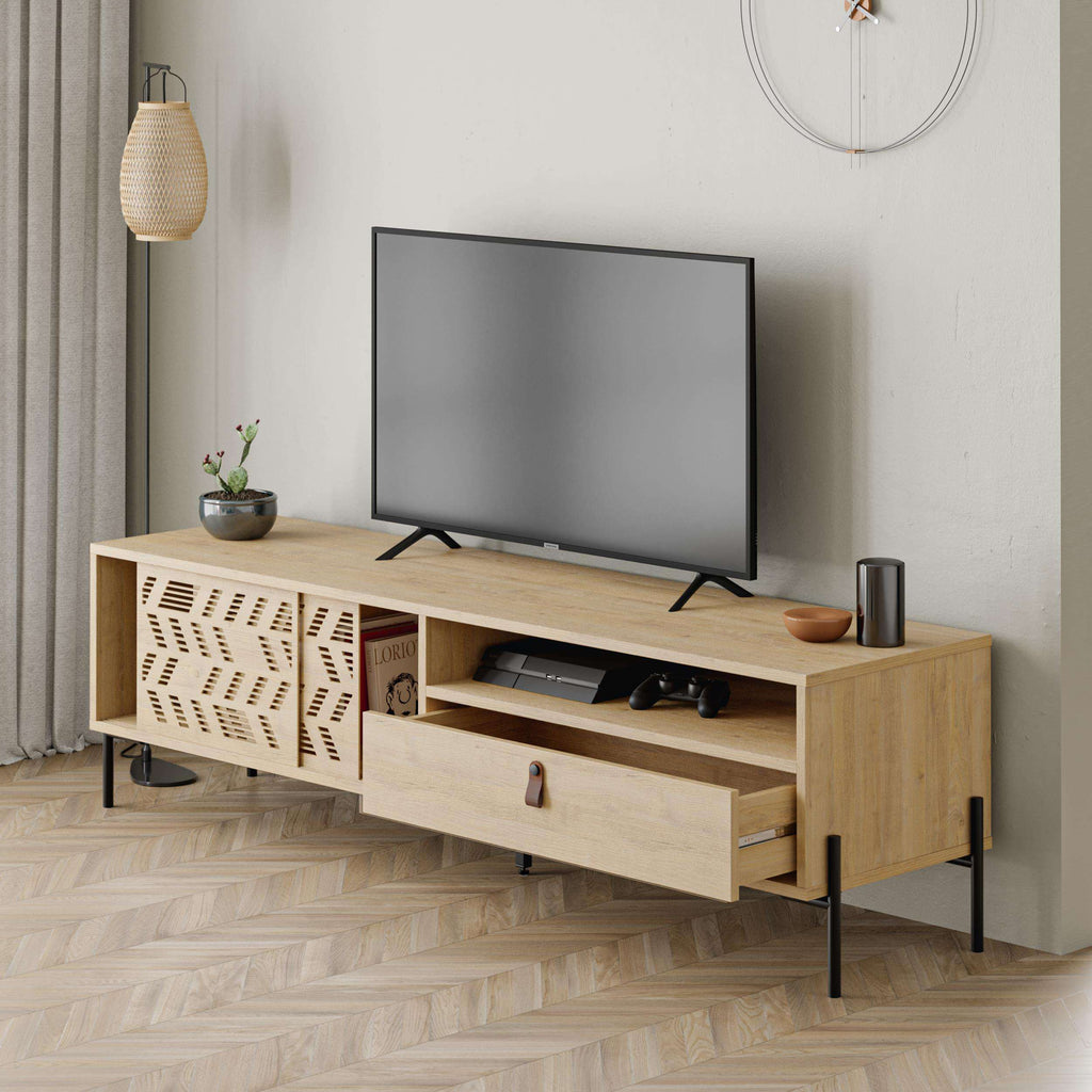 Light oak TV stand featuring patterned side doors, open media area, and drawers